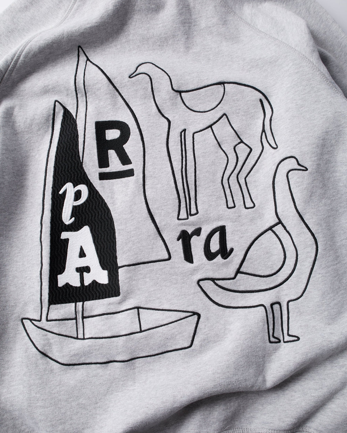 THE RIDDLE HOODED SWEATSHIRT