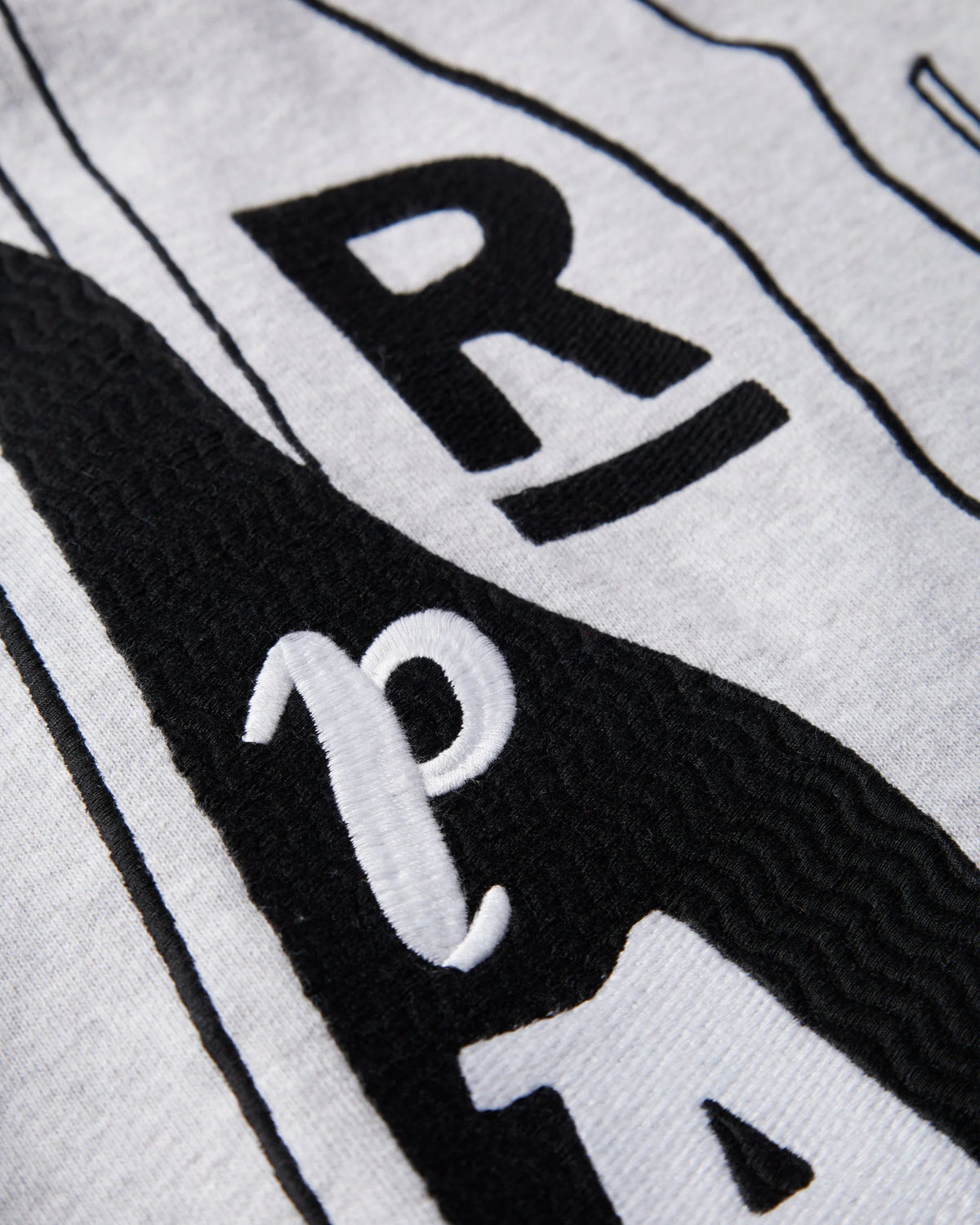 THE RIDDLE HOODED SWEATSHIRT