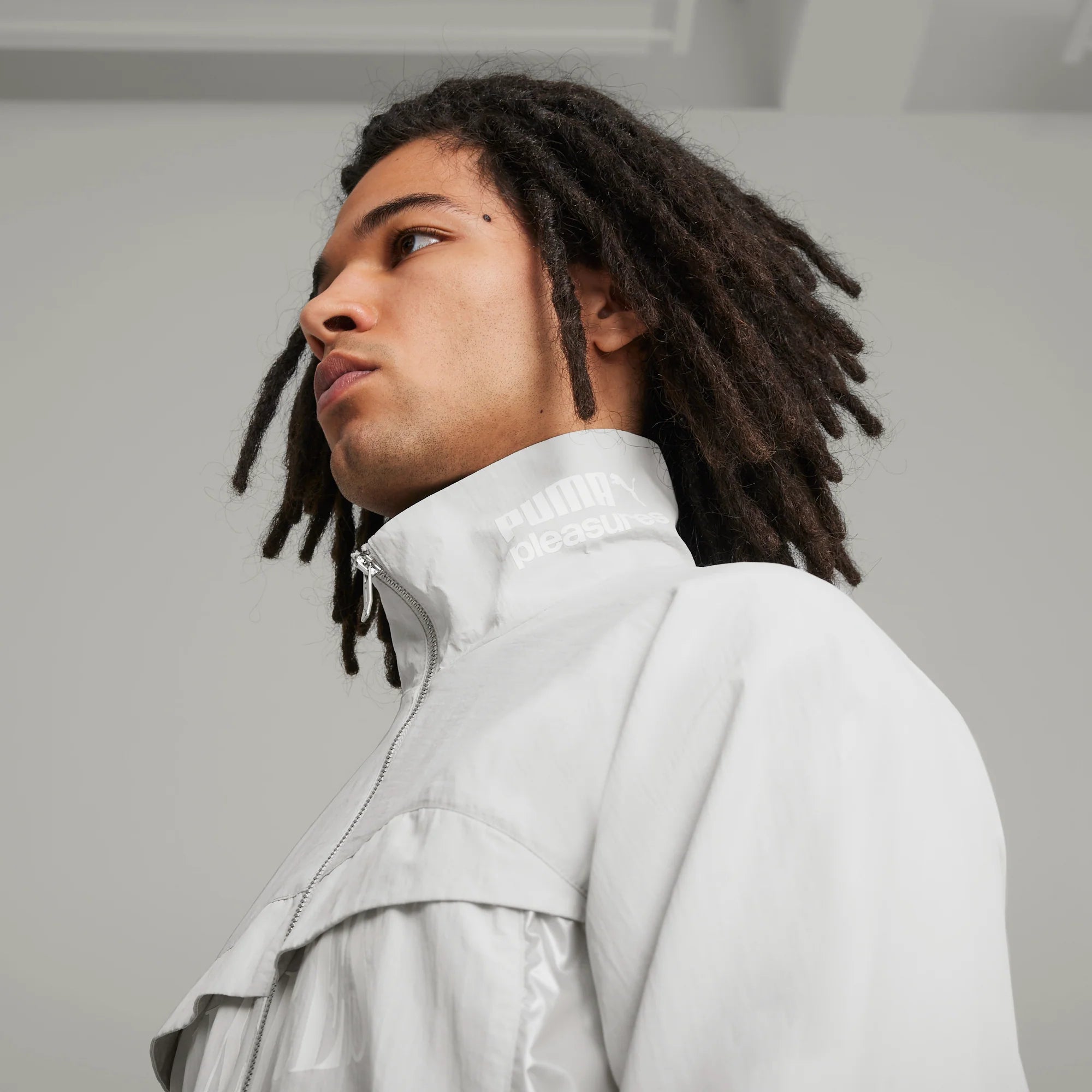 PUMA X PLEASURES CELLERATOR TRACK JACKET - GLACIAL GRAY I PUMA X PLEASURES CELLERATOR TRACK JACKET - GLACIAL GRAY I