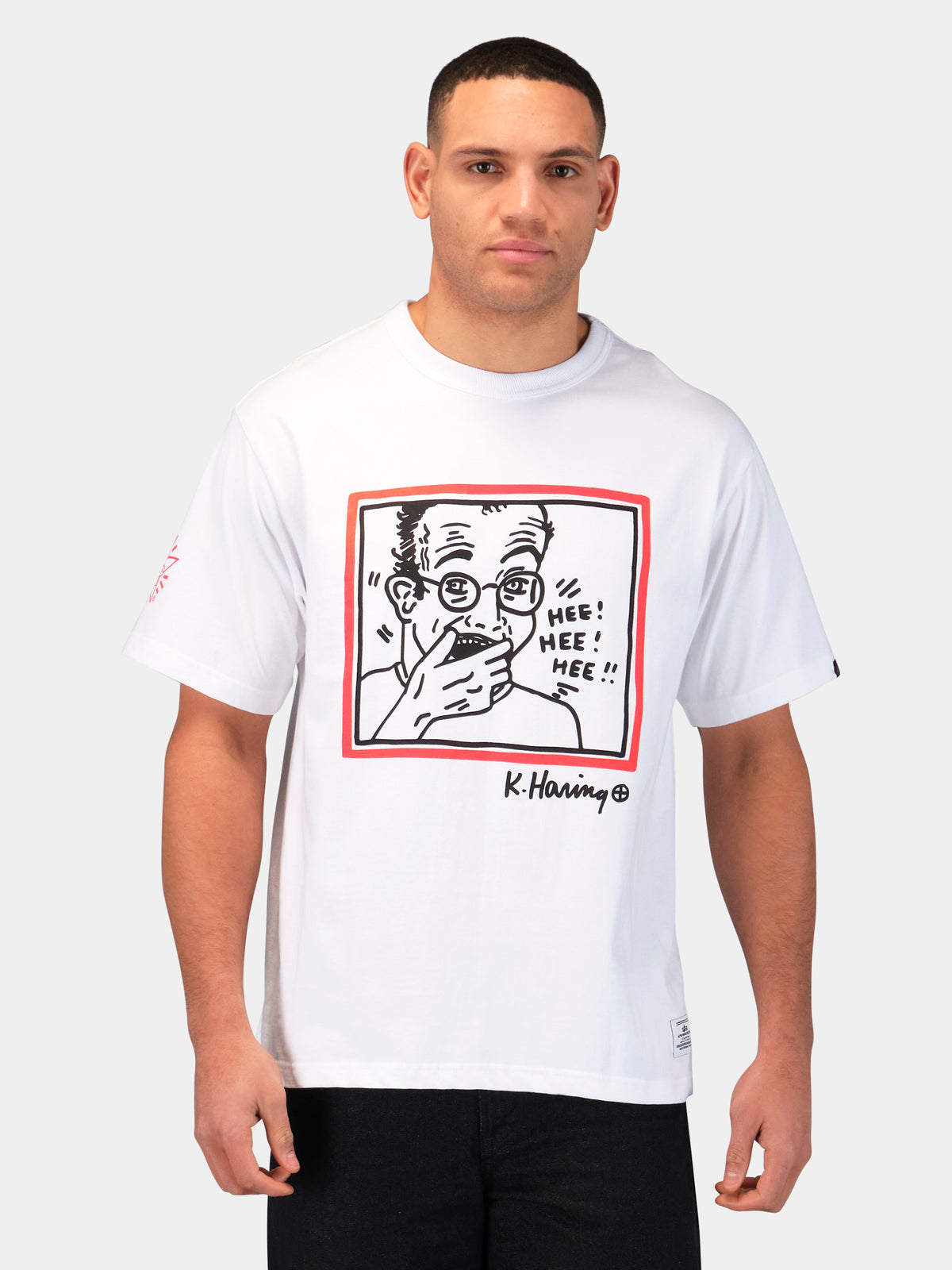 Keith Haring X Alpha Graphic Tee "Hee Hee" White
